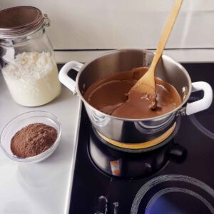 the process of preparing the chocolate coating for Eskimo Pie popsicles.